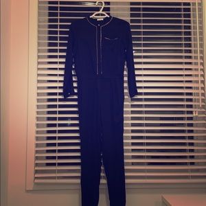 All black with some gold accents Chloe jumpsuit